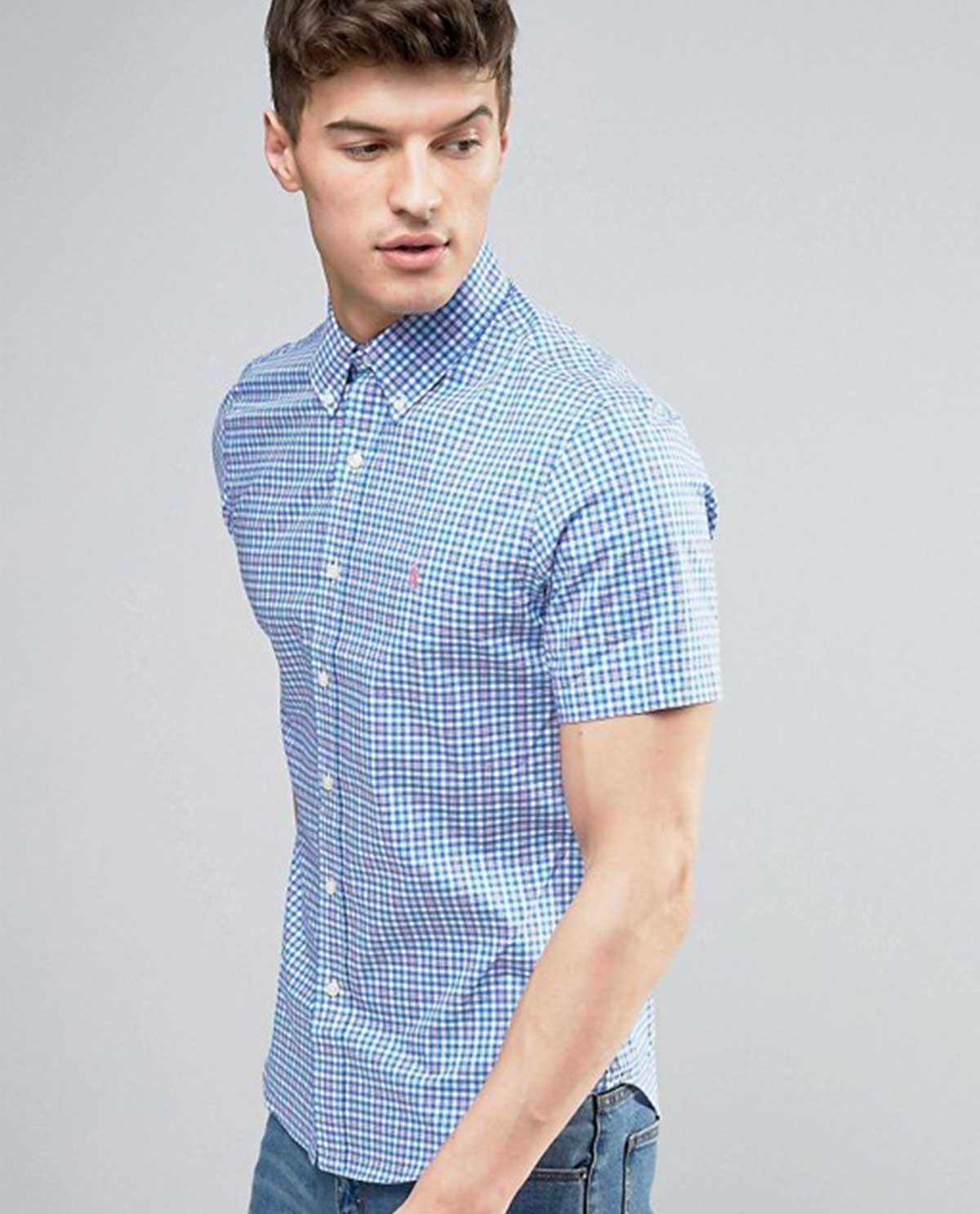 Model wearing the Ferro gingham oxford shirt in blue