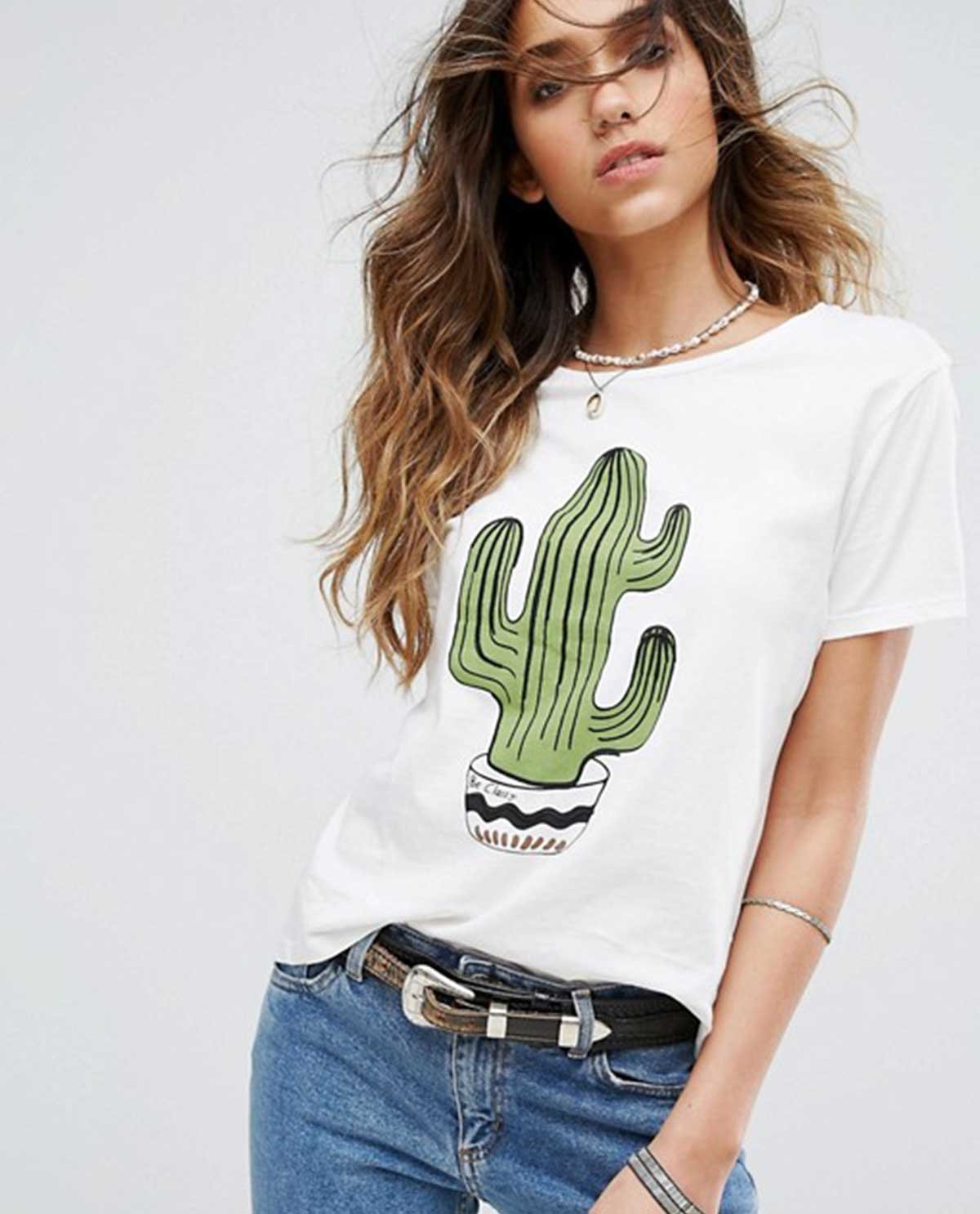 Model wearing the Sonora graphic tee in white