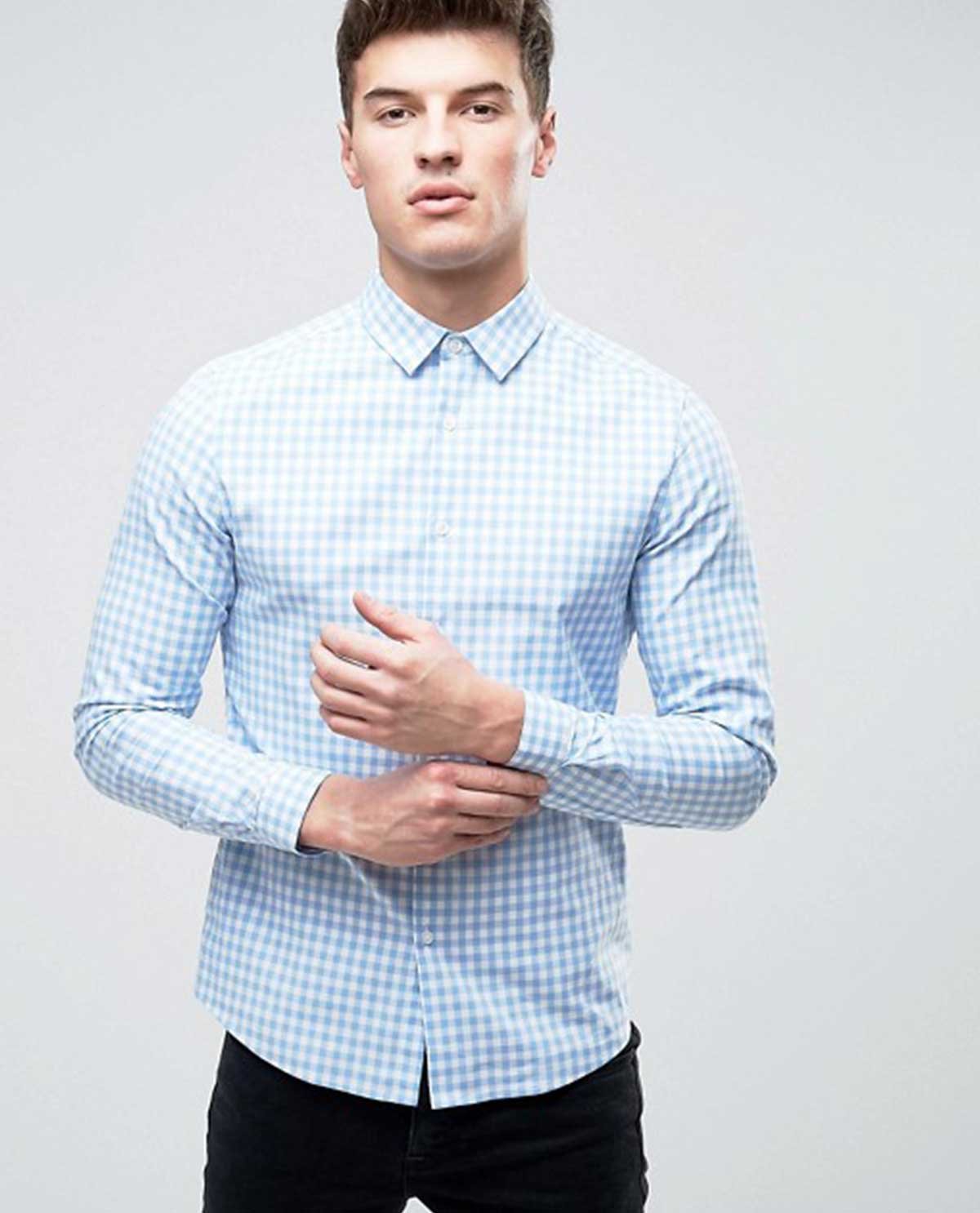 Model wearing the Coastal check shirt in pale blue